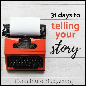 red typewriter with paper in carriage